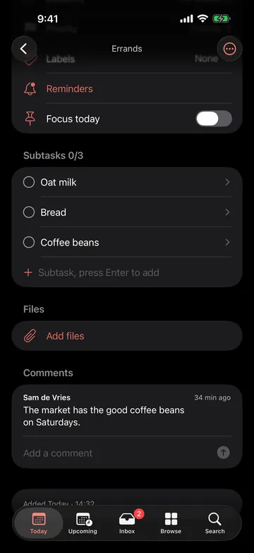 A task with reminders, three subtasks, a button to add files and a comment.